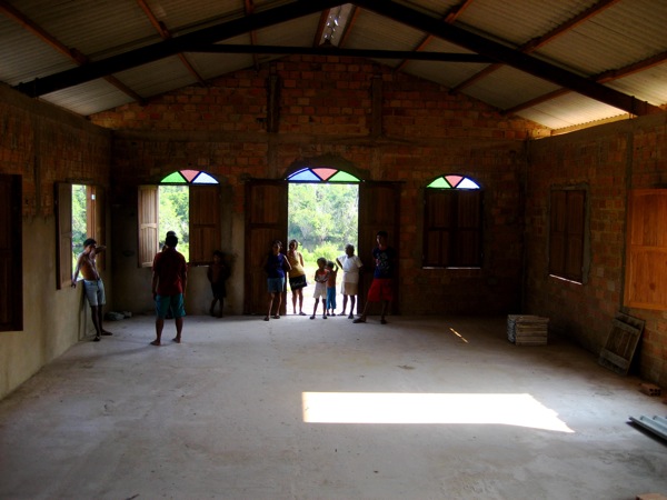 Inside there's not much left to do: tile the floor and finish the walls. I experienced for myself one of the things that makes Joaquim so well suited to this work: he is able to motivate the local residents to come together and finish this project and let God's story shine in Prainha of Maró through their brand new church building. It may not look like much, but trust me, this is the nicest building for many, many hours. Inside there's not much left to do: tile the floor and finish the walls. I experienced for myself one of the things that makes Joaquim so well suited to this work: he is able to motivate the local residents to come together and finish this project and let God's story shine in Prainha of Maró through their brand new church building. It may not look like much, but trust me, this is the nicest building for many, many hours.