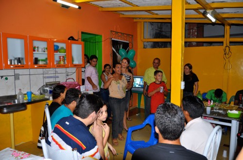 Claudete welcomes a new member into the family of God