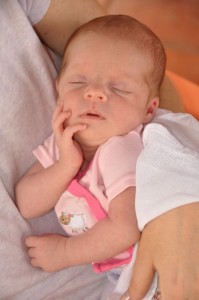 She must be dreaming of Christmas presents.